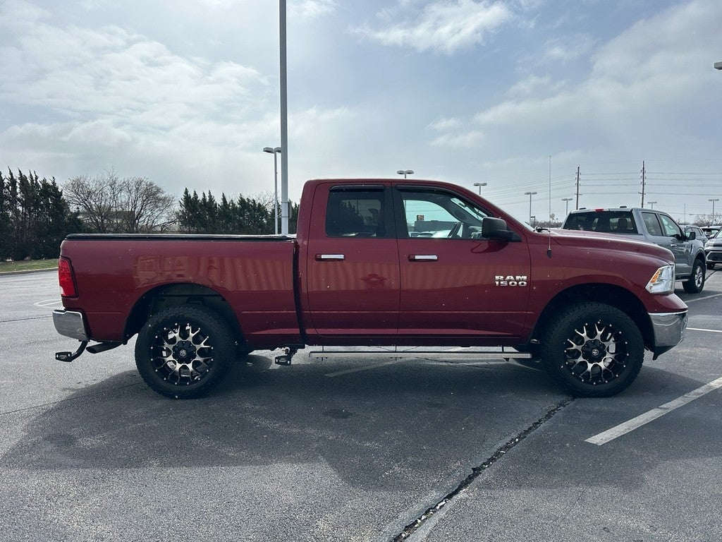 2015 RAM 1500 4WD Quad Cab 140.5" SLT
